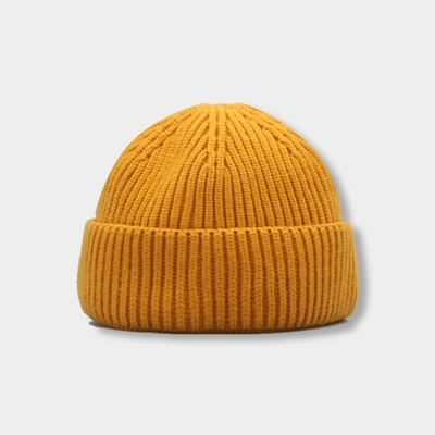 男女兼用のHeadwearのためのODMの冬によって編まれる帽子は暖かいHip Hop様式の通りを偶然保つ